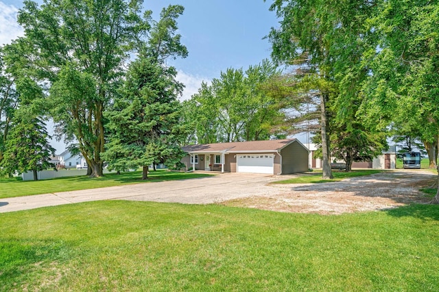 14893 Plank Rd, Sycamore, IL 60178 - view of front of property featuring dirt driveway, a garage, and a front lawn