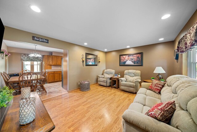 14893 Plank Rd, Sycamore, IL 60178 - living room featuring light wood-type flooring, recessed lighting, and a chandelier