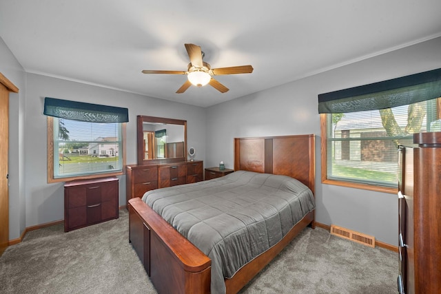 14893 Plank Rd, Sycamore, IL 60178 - bedroom with light colored carpet and ceiling fan