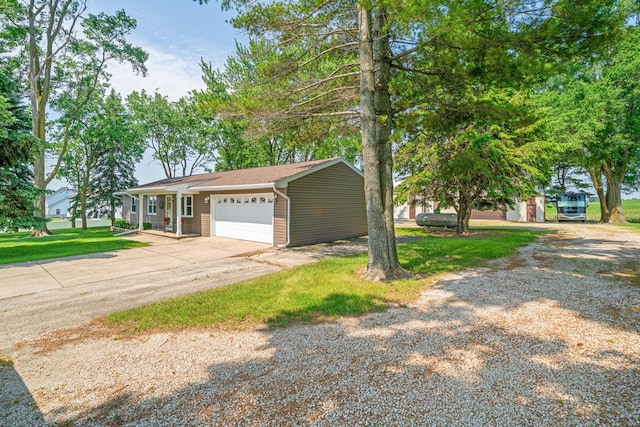14893 Plank Rd, Sycamore, IL 60178 - view of front of property with concrete driveway and an attached garage
