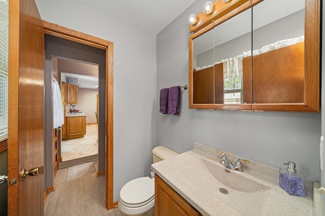 14893 Plank Rd, Sycamore, IL 60178 - bathroom featuring vanity and toilet