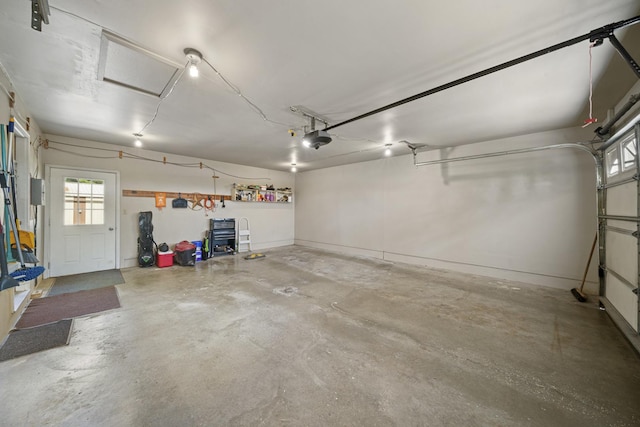 14893 Plank Rd, Sycamore, IL 60178 - garage featuring a garage door opener