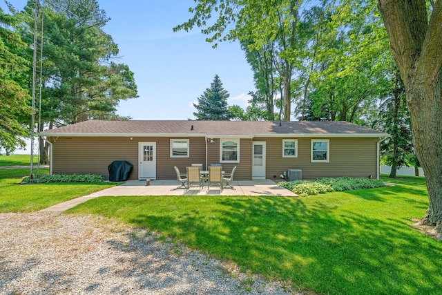 14893 Plank Rd, Sycamore, IL 60178 - back of house with a patio and a yard