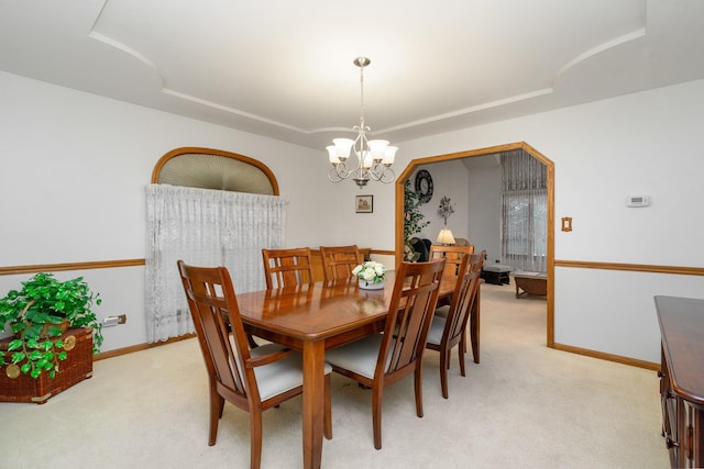 17815 Iroquois, Tinley Park, IL 60477 - dining room with a chandelier, a tray ceiling, and light carpet