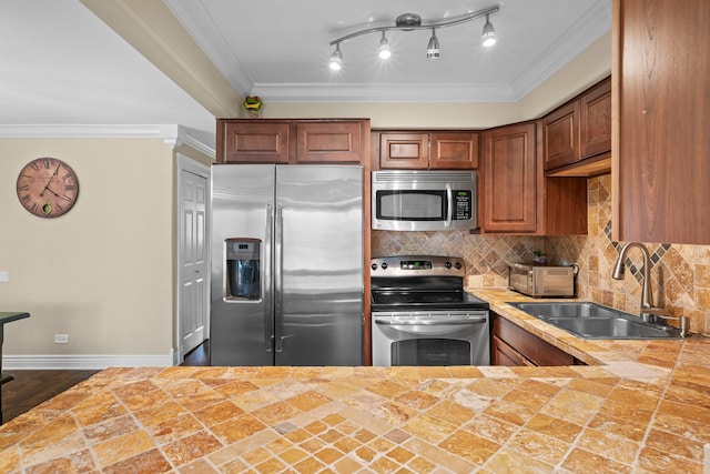 6401 W Home Ave Unit 6A, Worth, IL 60482 - kitchen featuring appliances with stainless steel finishes, decorative backsplash, crown molding, brown cabinetry, and tile countertops