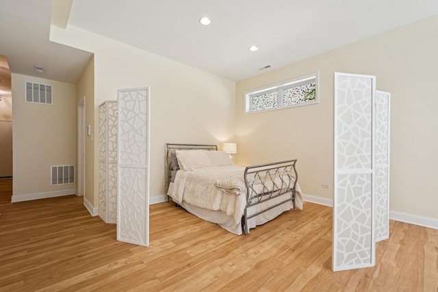 1720 W Diversey Pkwy Unit 1, Chicago, IL 60614 - bedroom with light wood finished floors and recessed lighting