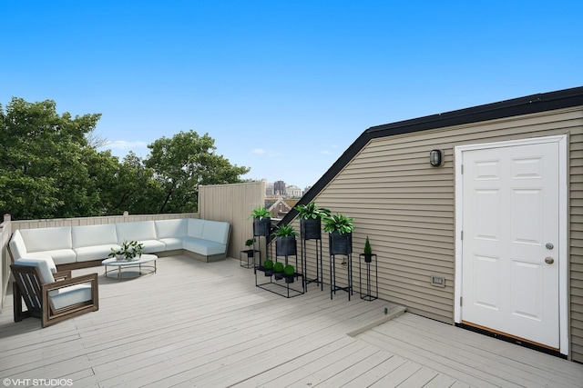 639 W Briar Pl Unit 4W, Chicago, IL 60657 - wooden terrace featuring an outdoor living space