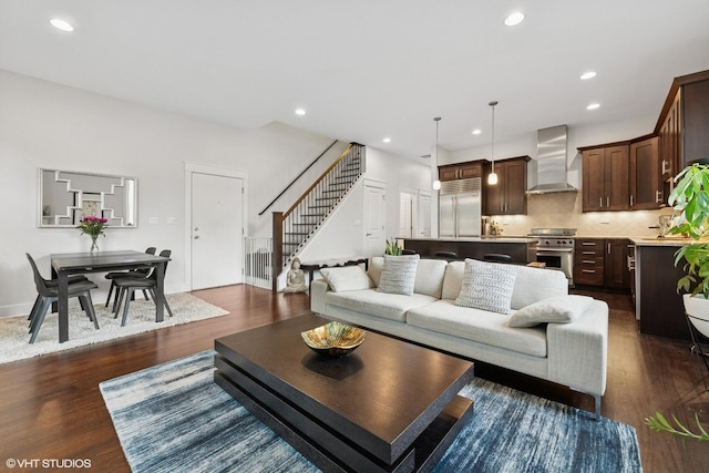 639 W Briar Pl Unit 4W, Chicago, IL 60657 - living area with stairway, dark wood finished floors, and recessed lighting