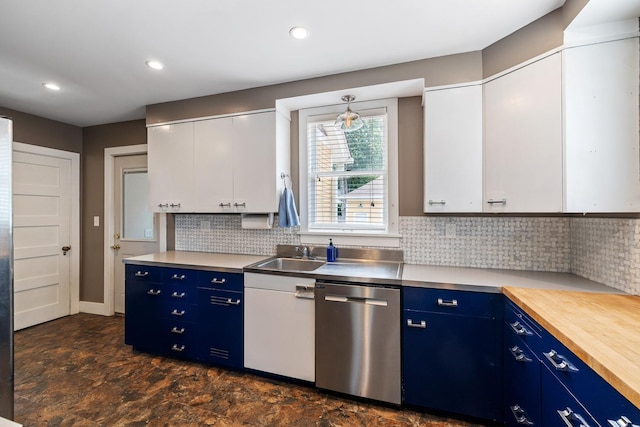 557 Garfield Ave, Aurora, IL 60506 - kitchen with stainless steel dishwasher, blue cabinetry, white cabinets, backsplash, and recessed lighting