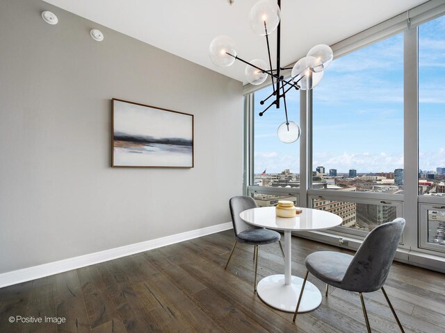 500 W Superior St Unit 1202, Chicago, IL 60654 - dining room featuring a chandelier, wood finished floors, and a view of city