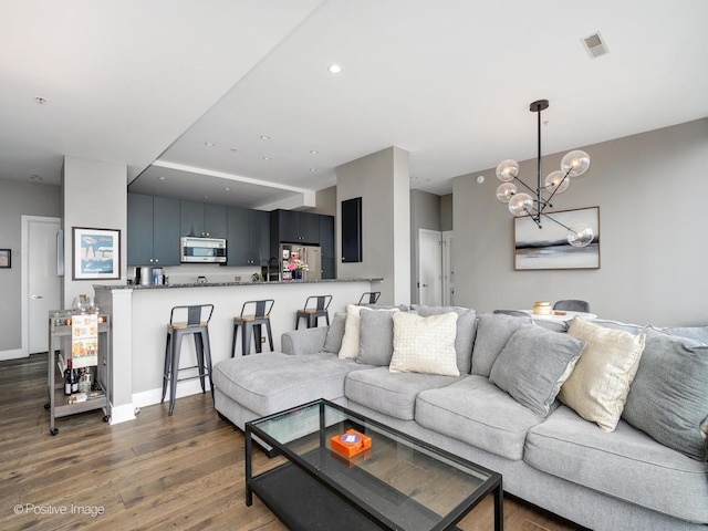 500 W Superior St Unit 1202, Chicago, IL 60654 - living area with a chandelier and dark wood-type flooring