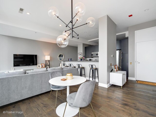 500 W Superior St Unit 1202, Chicago, IL 60654 - dining space with hardwood / wood-style floors, a chandelier, and recessed lighting