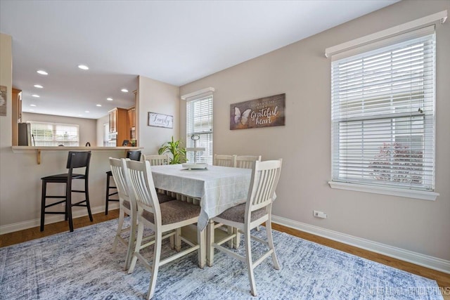 725 Bohannon Cir, Oswego, IL 60543 - dining area with wood finished floors and recessed lighting