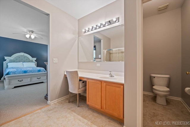 725 Bohannon Cir, Oswego, IL 60543 - bathroom featuring ensuite bathroom, a ceiling fan, vanity, and a shower with door