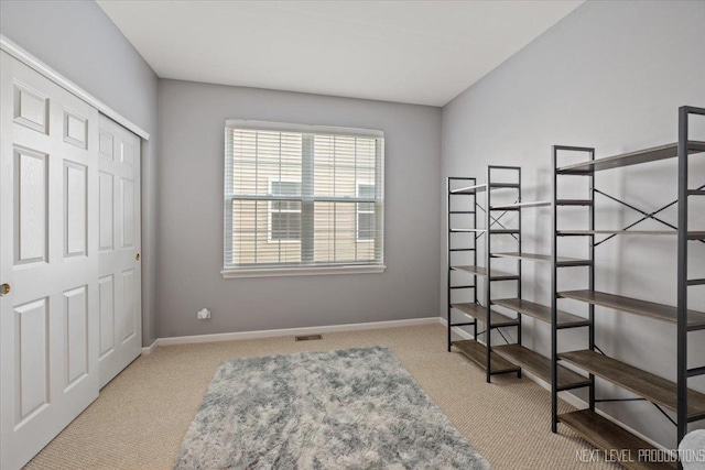 725 Bohannon Cir, Oswego, IL 60543 - unfurnished bedroom featuring carpet flooring and a closet