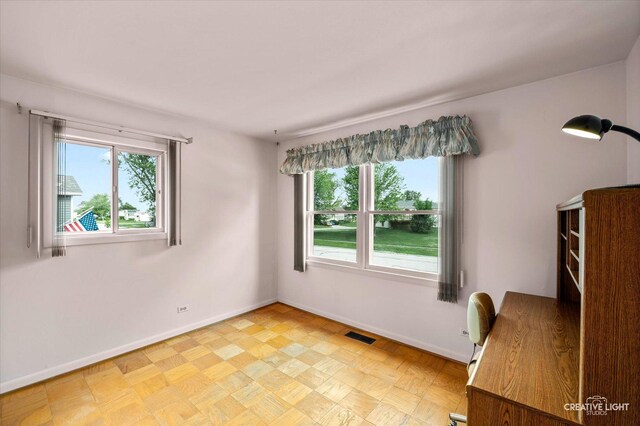 2211 Birchwood Pkwy, Woodridge, IL 60517 - unfurnished office with healthy amount of natural light and light flooring