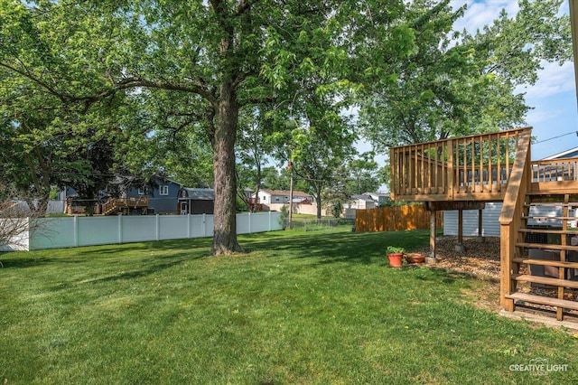 2211 Birchwood Pkwy, Woodridge, IL 60517 - view of yard with a deck and stairway