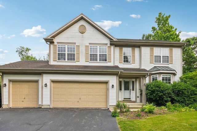 765 Providence Ln, Crystal Lake, IL 60012 - view of front of house with driveway and a garage
