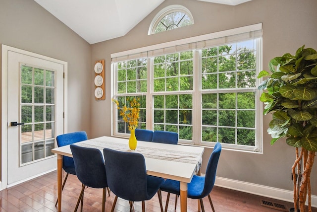 765 Providence Ln, Crystal Lake, IL 60012 - dining room featuring wood finished floors and vaulted ceiling