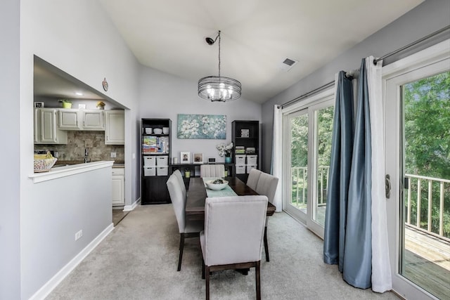 2406 Mallow Ct Unit V2, Schaumburg, IL 60194 - dining room featuring light carpet, lofted ceiling, and a chandelier