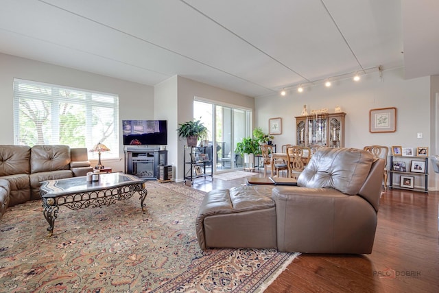 1199 E Port Clinton Rd Unit 209, Vernon Hills, IL 60061 - living area with track lighting and wood finished floors