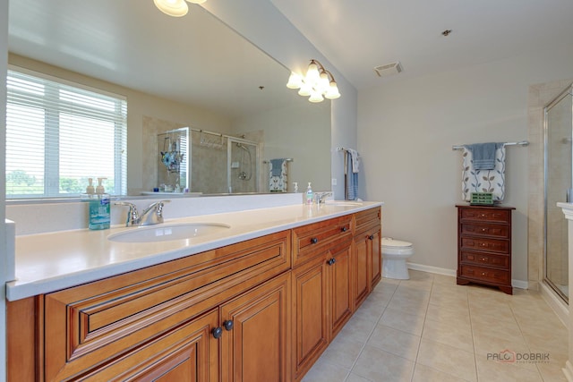 1199 E Port Clinton Rd Unit 209, Vernon Hills, IL 60061 - bathroom featuring double vanity, tile patterned floors, and a shower stall