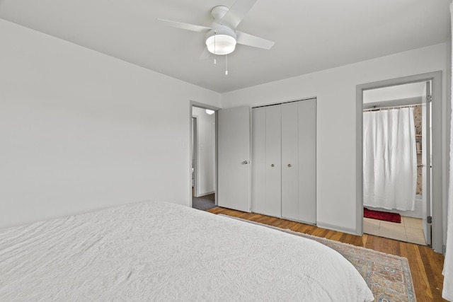 16401 Clark Ln, Tinley Park, IL 60477 - bedroom featuring wood finished floors, a closet, and a ceiling fan