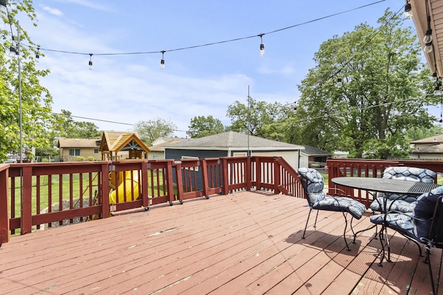 16401 Clark Ln, Tinley Park, IL 60477 - wooden deck featuring outdoor dining area and a playground