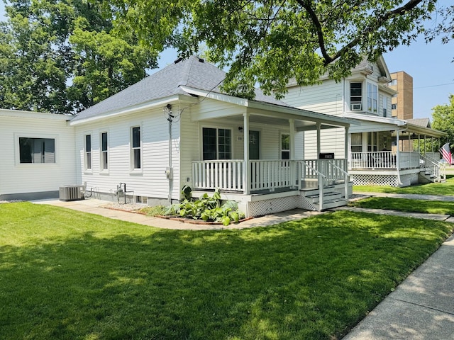 616 N Everett St, Streator, IL 61364 - view of front of home with covered porch, a front lawn, and roof with shingles