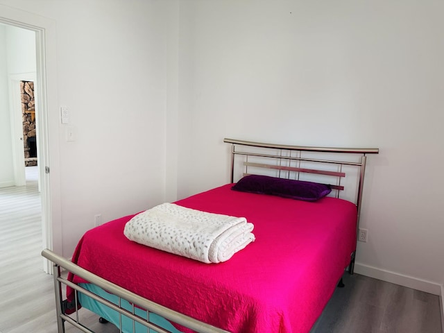 616 N Everett St, Streator, IL 61364 - bedroom with wood finished floors and baseboards