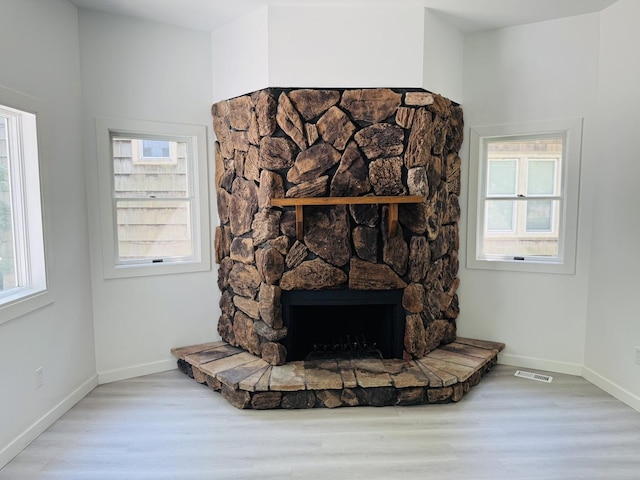 616 N Everett St, Streator, IL 61364 - detailed view of wood finished floors and a stone fireplace