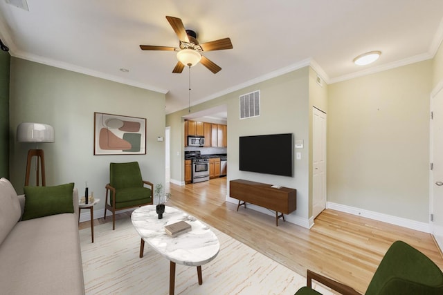 4333 N Troy St Unit 3E, Chicago, IL 60618 - living room featuring ornamental molding, ceiling fan, and light wood-style floors