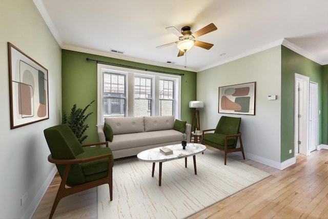 4333 N Troy St Unit 3E, Chicago, IL 60618 - living area with ornamental molding, a ceiling fan, and light wood-type flooring