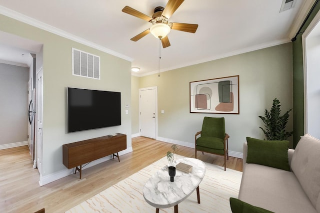 4333 N Troy St Unit 3E, Chicago, IL 60618 - living area featuring ornamental molding, light wood-style flooring, and a ceiling fan