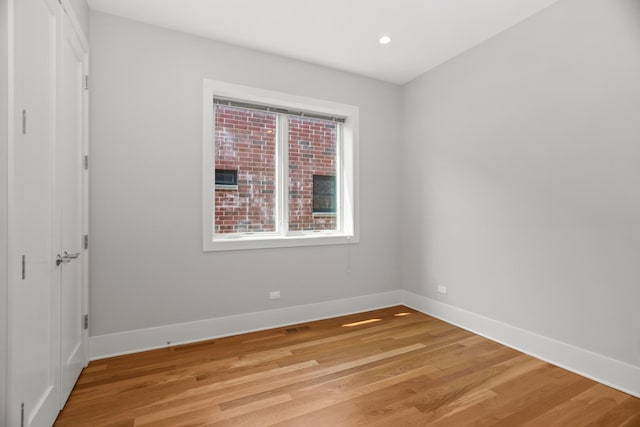 4133 N Kenmore Ave Unit 2S, Chicago, IL 60613 - spare room with light wood-type flooring and recessed lighting