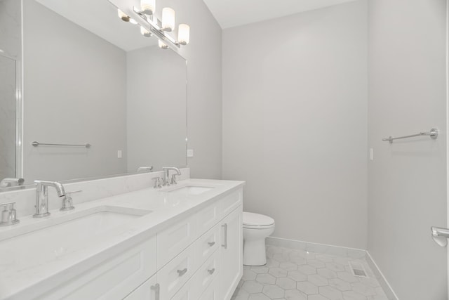 4133 N Kenmore Ave Unit 2S, Chicago, IL 60613 - bathroom featuring double vanity and tile patterned flooring