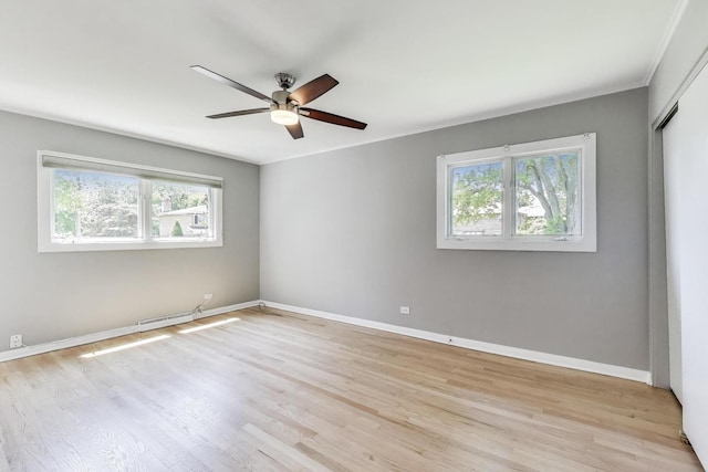 471 Highcrest Dr, Wilmette, IL 60091 - unfurnished room with ceiling fan, light wood-style flooring, and ornamental molding