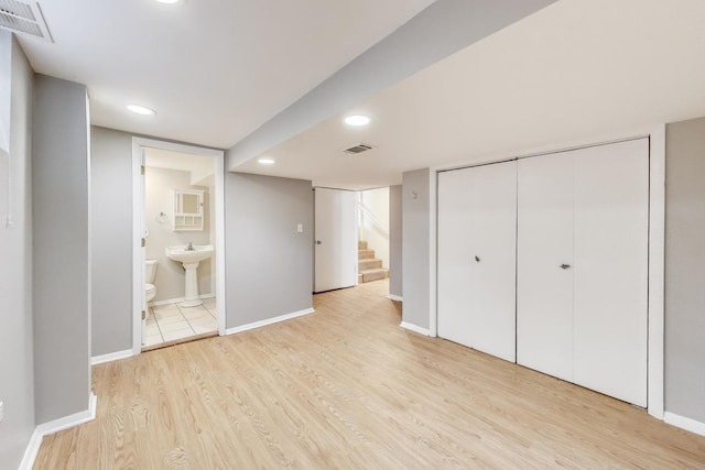 471 Highcrest Dr, Wilmette, IL 60091 - unfurnished bedroom with light wood-style floors, a closet, ensuite bathroom, and recessed lighting