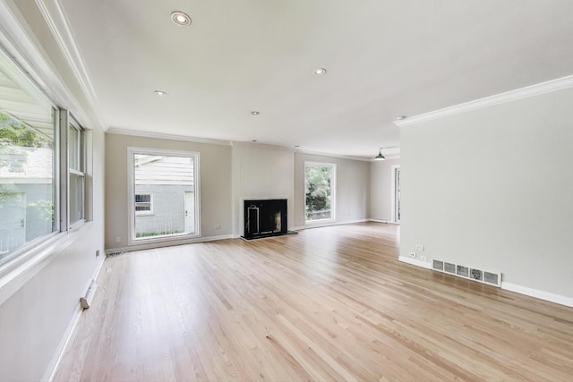 471 Highcrest Dr, Wilmette, IL 60091 - unfurnished living room with crown molding, light wood finished floors, a fireplace, and recessed lighting