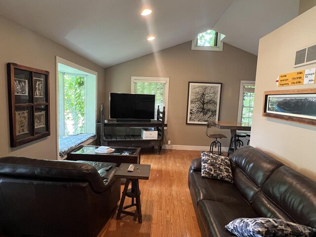 500 N Grant St, Westmont, IL 60559 - living area featuring wood finished floors, vaulted ceiling, and recessed lighting