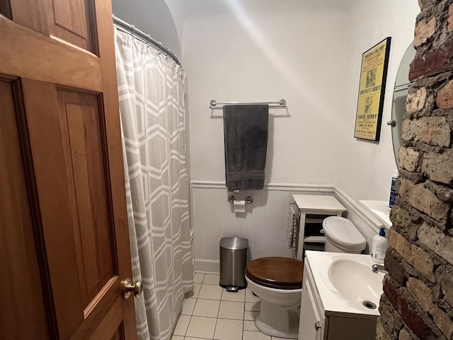 500 N Grant St, Westmont, IL 60559 - bathroom with vanity, tile patterned flooring, wainscoting, and curtained shower