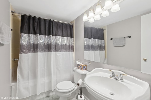 1521 S County Farm Rd Unit 1-3C, Wheaton, IL 60189 - bathroom with a sink and shower / bath combo