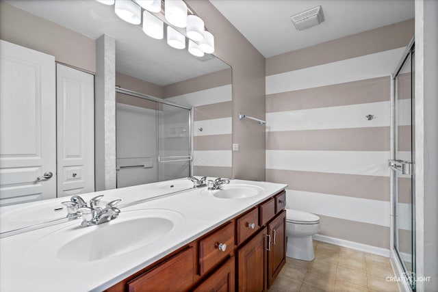 24825 W Gates Ct, Plainfield, IL 60585 - full bath with a shower with shower door, double vanity, and tile patterned flooring