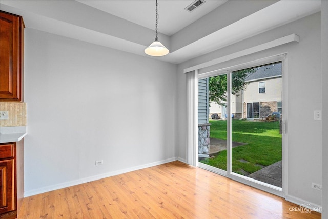 24825 W Gates Ct, Plainfield, IL 60585 - unfurnished dining area with light wood-type flooring