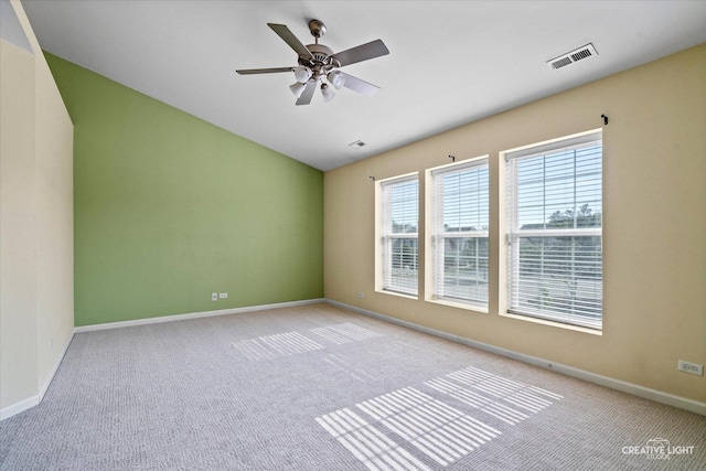 24825 W Gates Ct, Plainfield, IL 60585 - carpeted spare room featuring lofted ceiling and ceiling fan