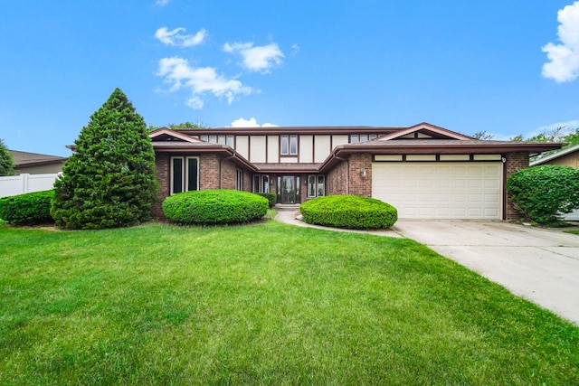 12850 S Westport Dr, Palos Park, IL 60464 - tudor house featuring brick siding, an attached garage, and driveway