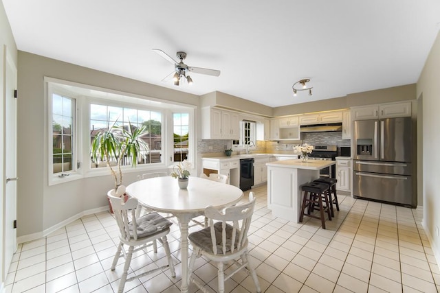 12850 S Westport Dr, Palos Park, IL 60464 - dining space featuring ceiling fan and light tile patterned floors