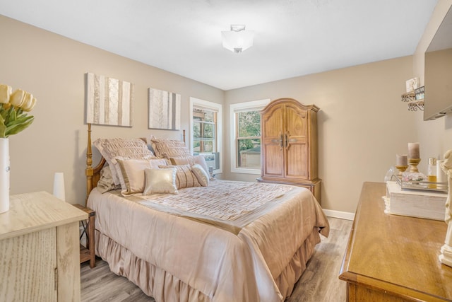 2241 S 17th Ave, North Riverside, IL 60546 - bedroom with light wood-style flooring and baseboards