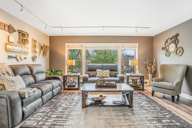 2241 S 17th Ave, North Riverside, IL 60546 - living room featuring track lighting and wood finished floors