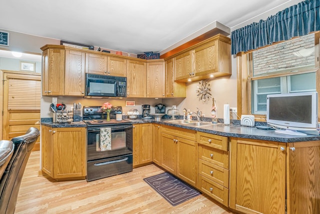 2241 S 17th Ave, North Riverside, IL 60546 - kitchen featuring black appliances and light wood-style floors